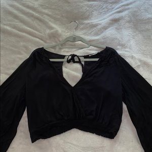 Black bell sleeved crop top